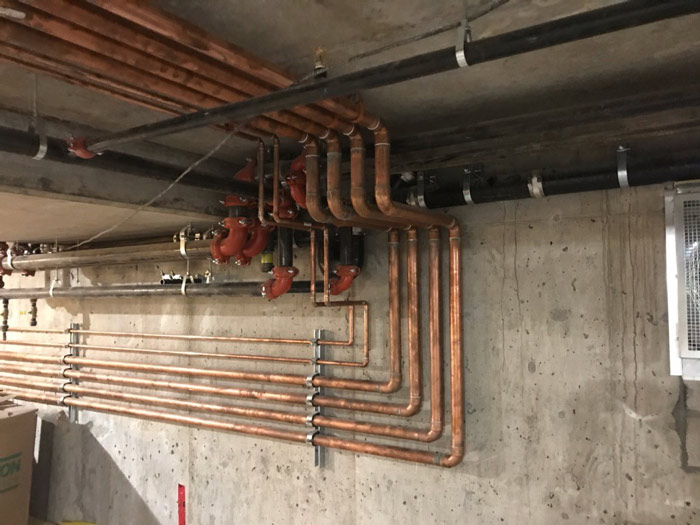 copper piping on wall